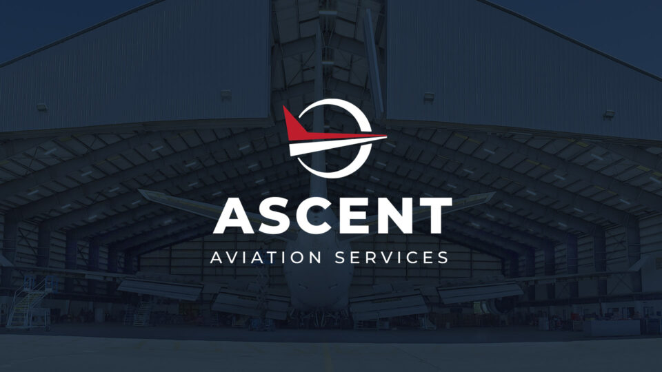 Ascent Aviation Services logo over aircraft hangar background