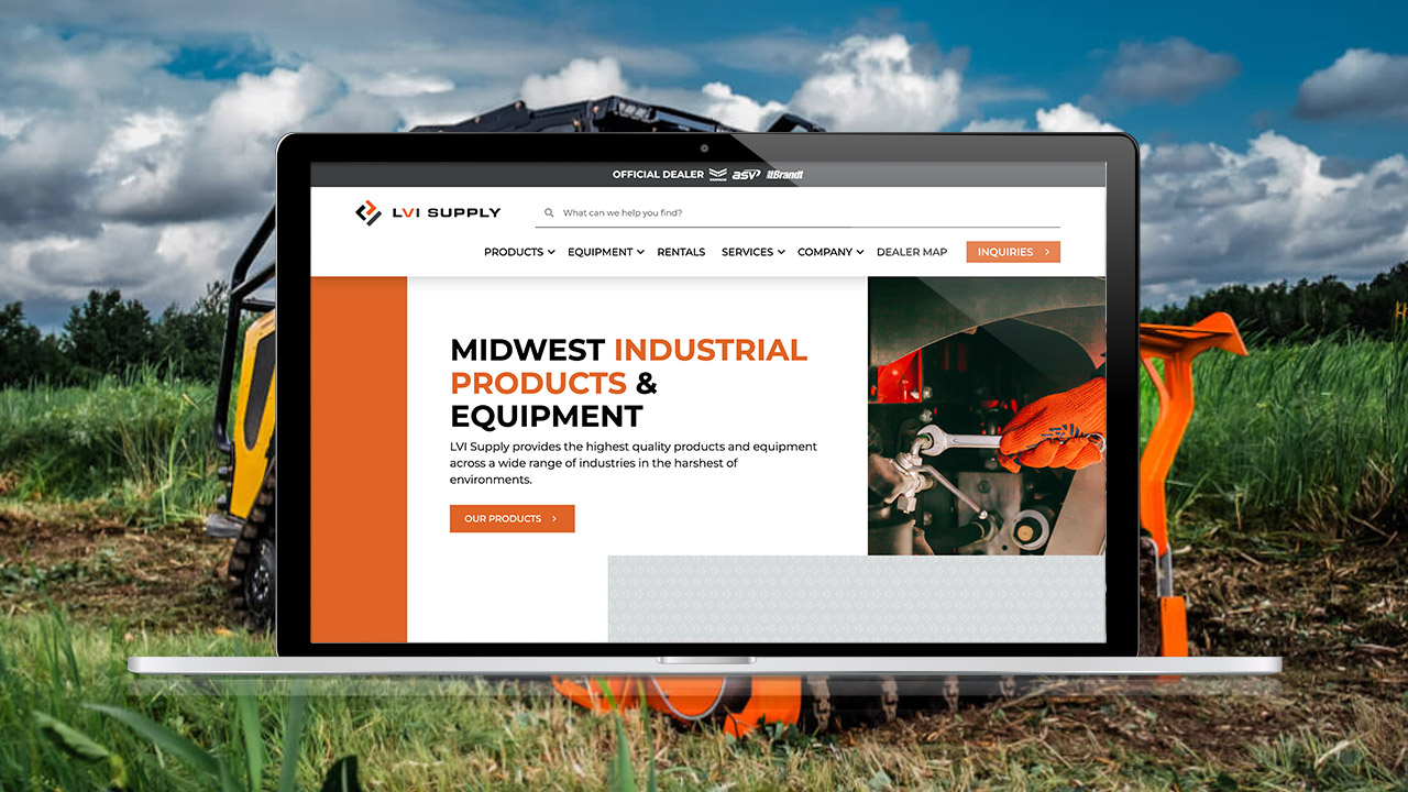 Laptop displays Midwest industrial products website.