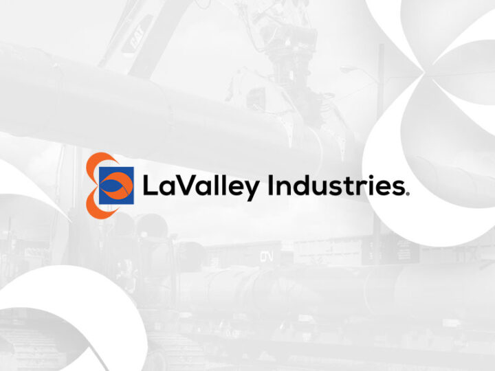 LaValley Industries logo on industrial background.